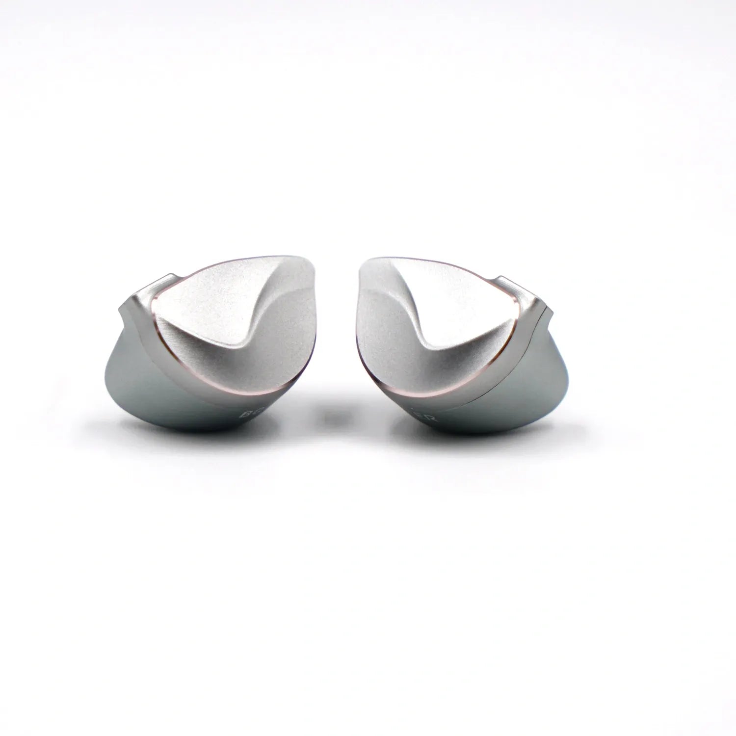 Angled view of the ergonomic silver aluminum shells for the BQEYZ hifi IEM earphone.